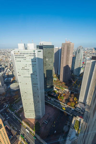 Aerial view of downtown Tokyo city skyline showing skyscraper high-rise corporate office buildings in Nishi Shinjuku, Shinjuku, Tokyo, Japan.