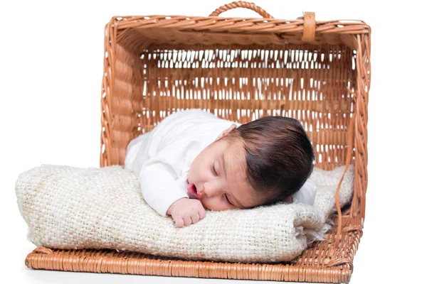Cute baby girl in a basket — Stock Photo, Image