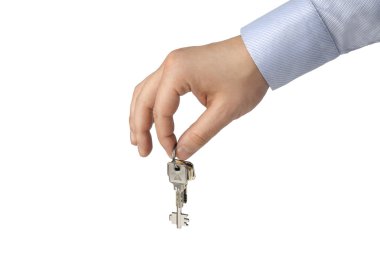 Bir işadamı bir el tutmak beyaz izole bir ev anahtarı 