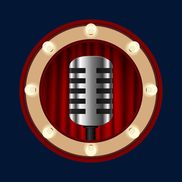 Retro microphone on a background of red curtains in a circle of light bulbs