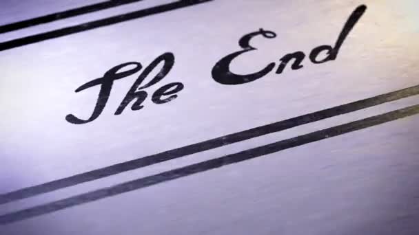 "The end" on a paper. — Stock Video