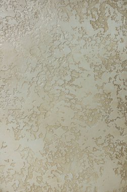 yüzey üzerinde soyut desenleri olan düz renkli çimento dokusu