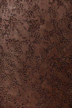 yüzey üzerinde soyut desenleri olan düz renkli çimento dokusu