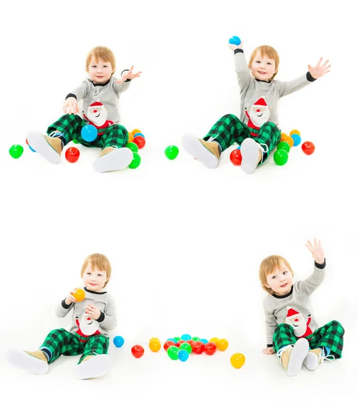 Playful boy with colorful balls — Stock Photo, Image