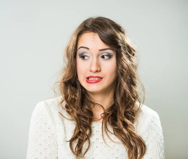 Vrouw met moeite gezicht expressie — Stockfoto