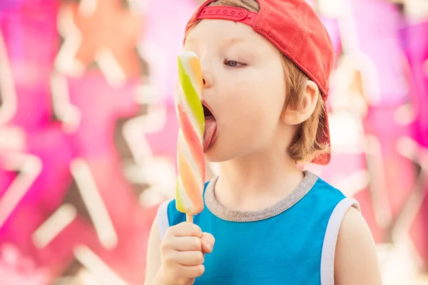 Little boy licking ice cream — Stock Photo, Image
