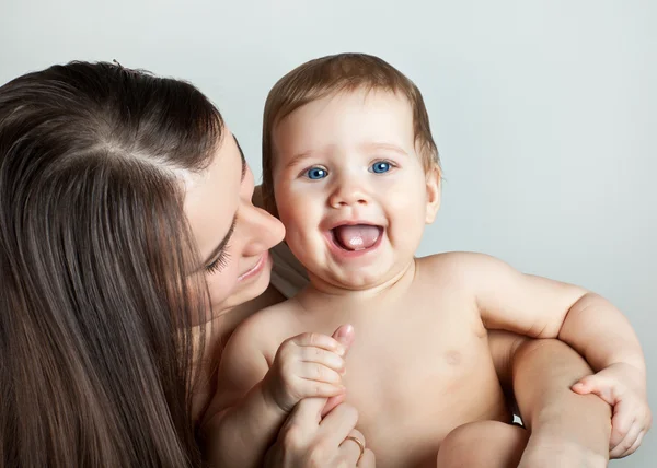 Happy baby playing with mother — Stock Photo, Image