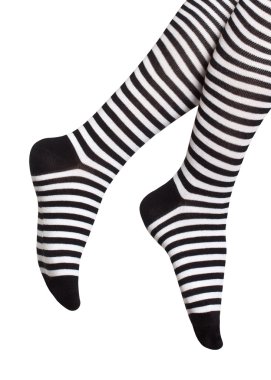 Feet in black-and-white striped socks isolated on white background clipart