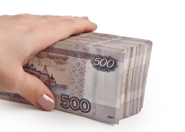 Mano femminile in possesso di un pacchetto di carta moneta russa — Foto Stock