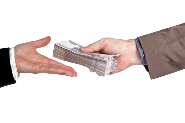 Male and female hand with a pack of Russian money Stock Photo