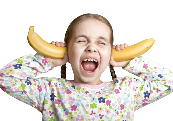 Screaming the girl closed her ears with bananas — Stock Photo, Image