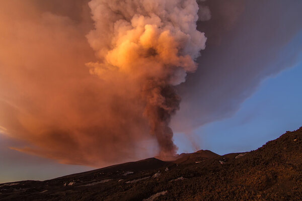 Volcano eruption. Mount Etna erupting from the crater Voragine