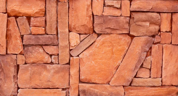 Textura de pared de ladrillo de piedra naranja para fondo — Foto de Stock