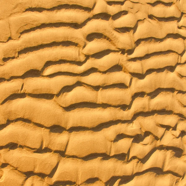 Close-up texture of beach sand background — Stock Photo, Image