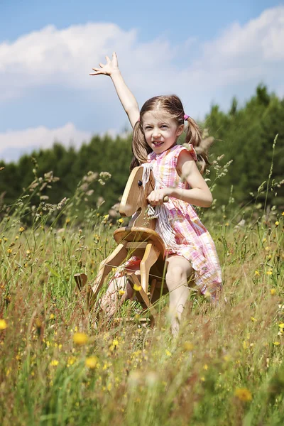 Girl riding a horse — Stock Photo, Image