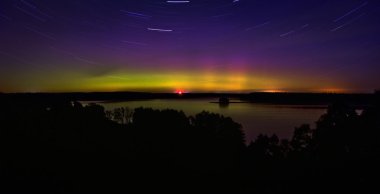 Northern lights in Poland. The area of Suwalki  07.10.2015 clipart