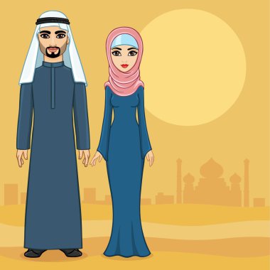 Arap aile çöl ve antik kentin karşı geleneksel giysiler içinde. Tam büyüme.