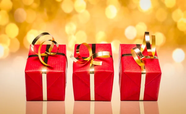 Trois cadeaux rouge — Stockfoto