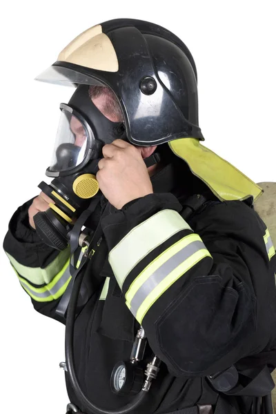 Firefighter corrects overview mask breathing apparatus — Stock Photo, Image