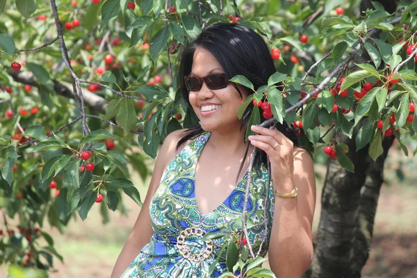 Girl by Cherry Tree — Stock Photo, Image