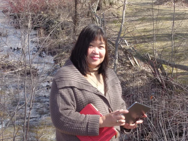 Lady by Drainage Ditch — Stock Photo, Image