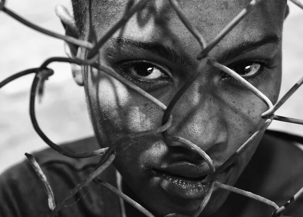 Woman Behind a Fence — Stock Photo, Image