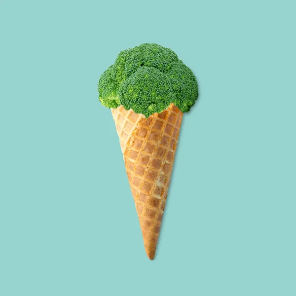 Broccoli ice cream cone photo manipulation on pastel green background