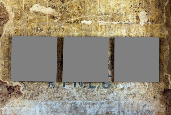 Three empty painting frames — Stock Photo, Image