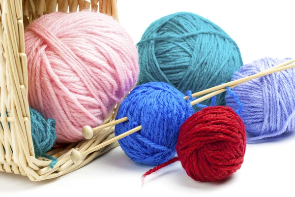Colorful yarn balls falling on white background — Stock Photo, Image