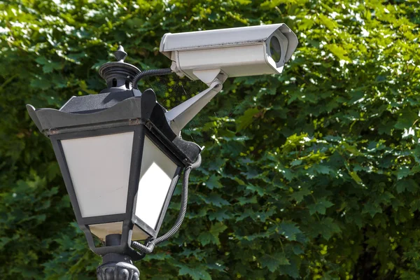 Camera cctv on top of street lantern — Stock Photo, Image