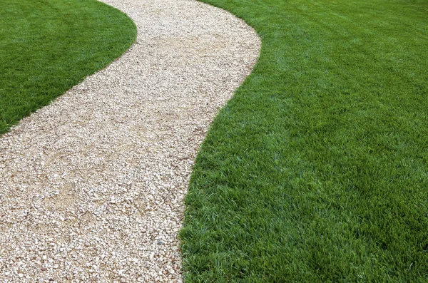 Park path and green lawn — Stock Photo, Image