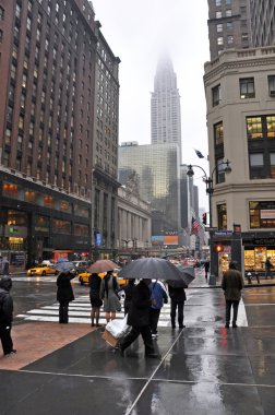 Wet Afternoon on the Corner of Madison & 42nd Street clipart