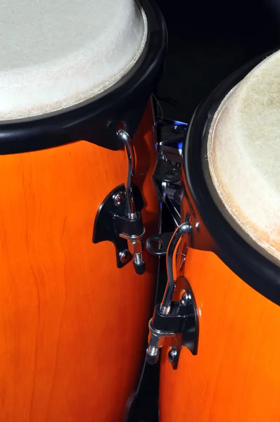 Orange Congas isolated on black background — Stock Photo, Image