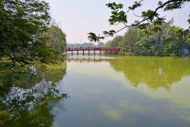 Lake Hoan Kiem & Red Bridge in Spring Hanoi Vietnam clipart