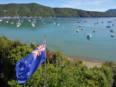 New Zealand Flag Proudly Fluttering in Marlborough Sounds clipart