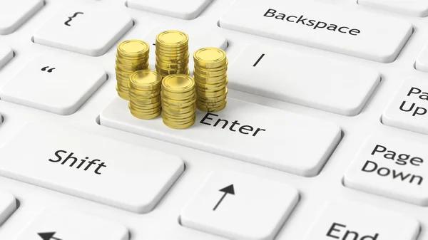 Stacks of golden coins on white  laptop keyboard — Stock Photo, Image