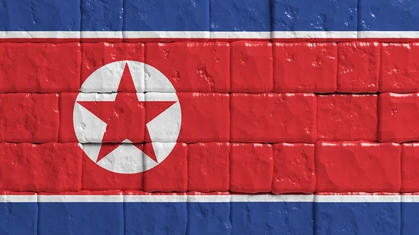 Parede de tijolo com bandeira pintada da Coreia do Norte — Fotografia de Stock