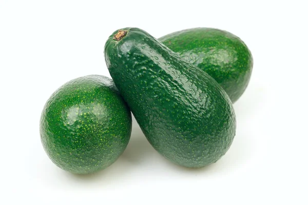 Tři plody avokáda, na bílém pozadí. — Stock fotografie