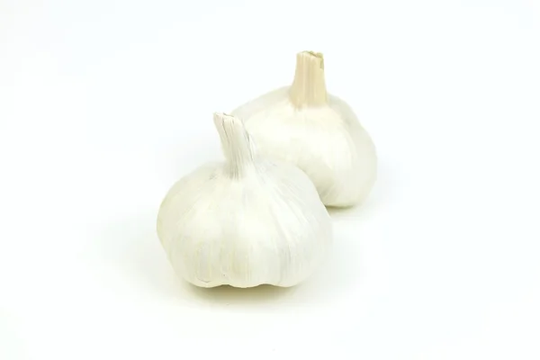 Two garlic bulbs, on white background. — Stock Photo, Image