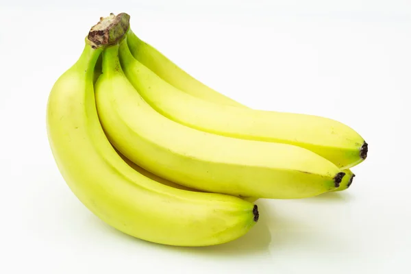 Banda čerstvých banánů, na bílém pozadí. — Stock fotografie