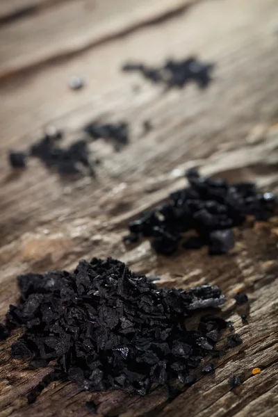 Close-up of pile of black salt — Stock Photo, Image