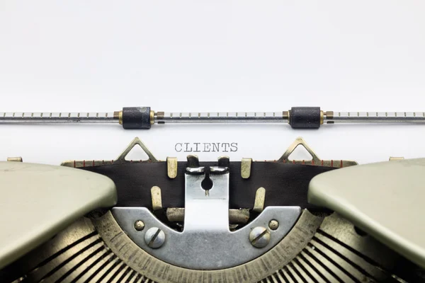 Clients word in capital letters on white sheet — Stock Photo, Image