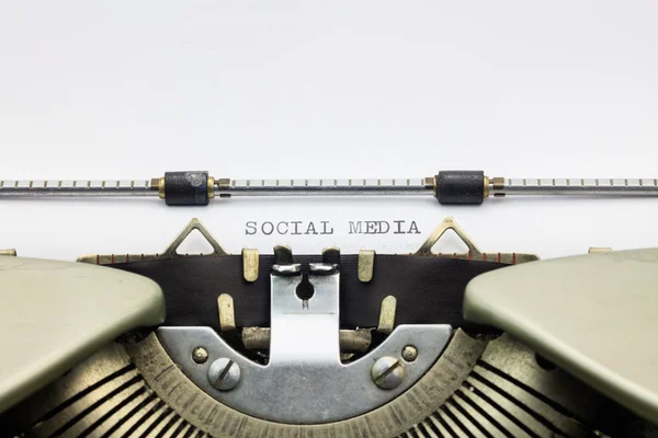 Social Media words in capital letters on white sheet — Stock Photo, Image