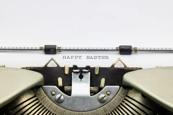 Happy Easter words in capital letters on white sheet — Stock Photo, Image