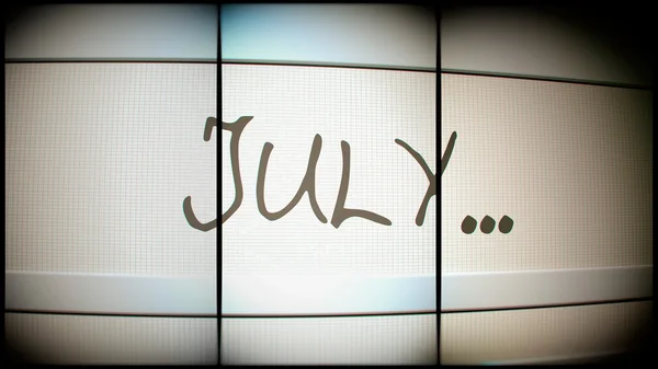 Juli met weglatingsteken op scherm van pc — Stockfoto