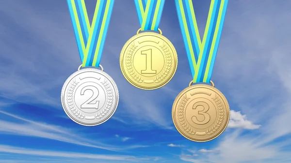Três medalhas no fundo do céu azul — Fotografia de Stock