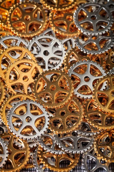Closeup of metallic cogwheels pile — Stock Photo, Image