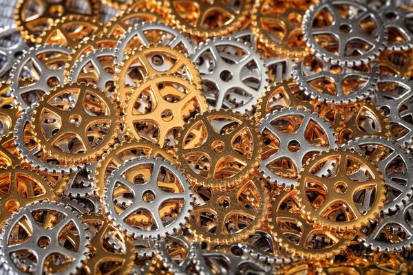 Closeup of metallic cogwheels pile — Stock Photo, Image