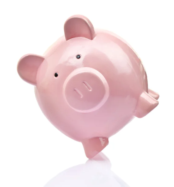 Piggy banco balanceamento no fundo branco — Fotografia de Stock