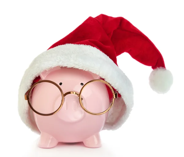 Piggy bank with Santa Claus hat and eyeglasses — Stock Photo, Image